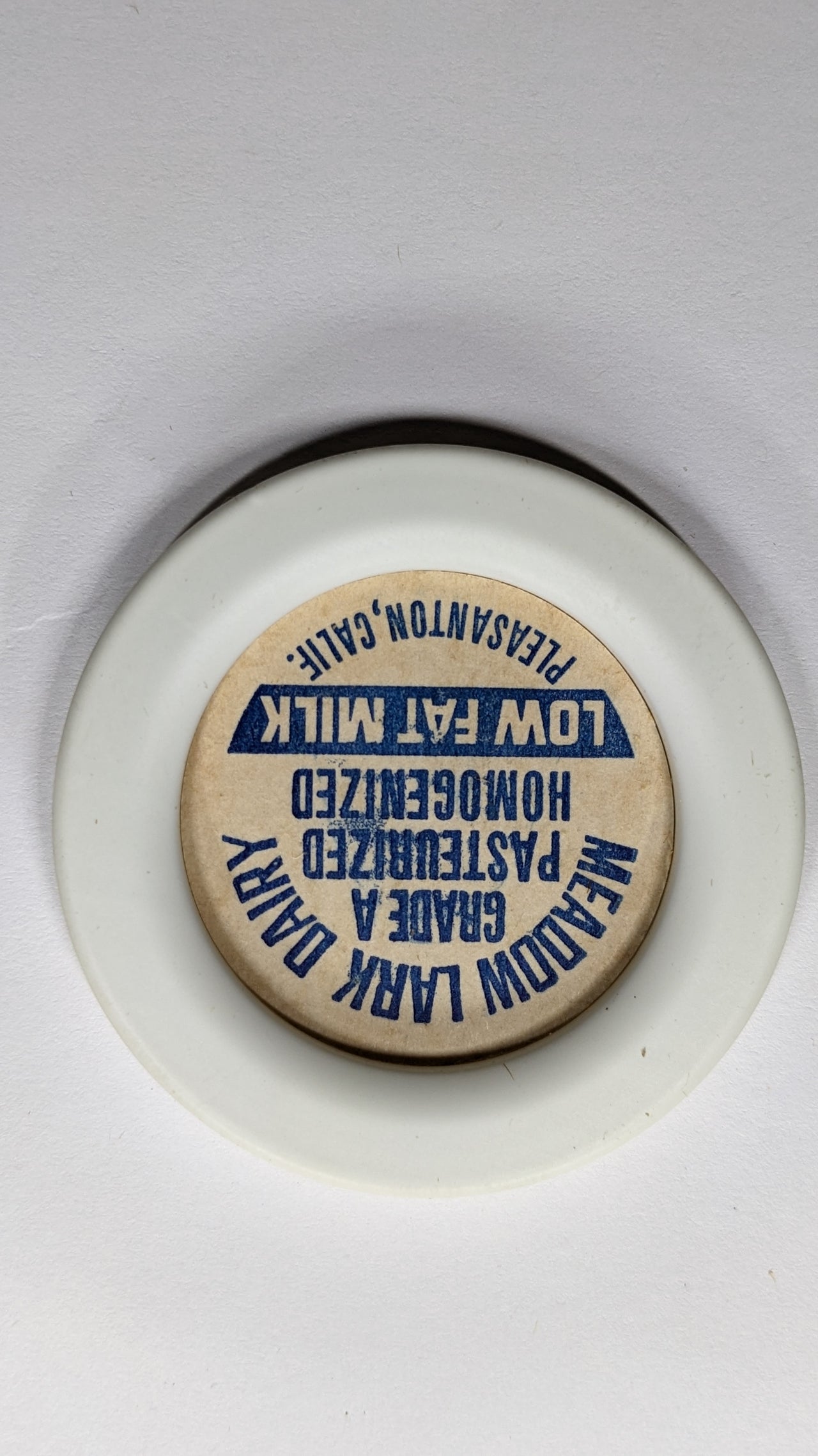 One of a kind custom MEADOWLARK DAIRY antique milk caps